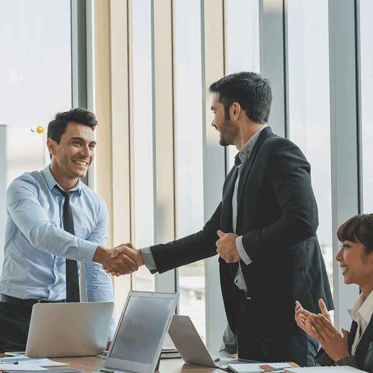 two men shaking hands