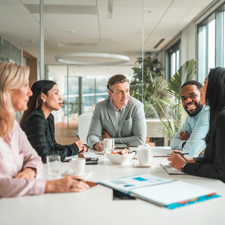 co workers gathered around a table