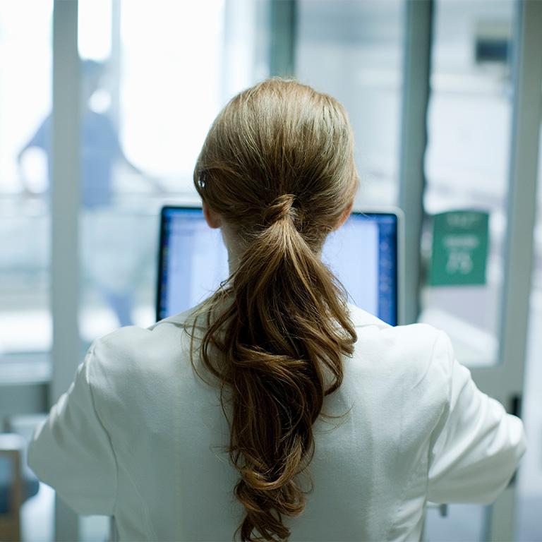 back of a woman's head with a ponytail