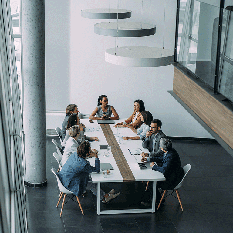 co workers gathered around a table