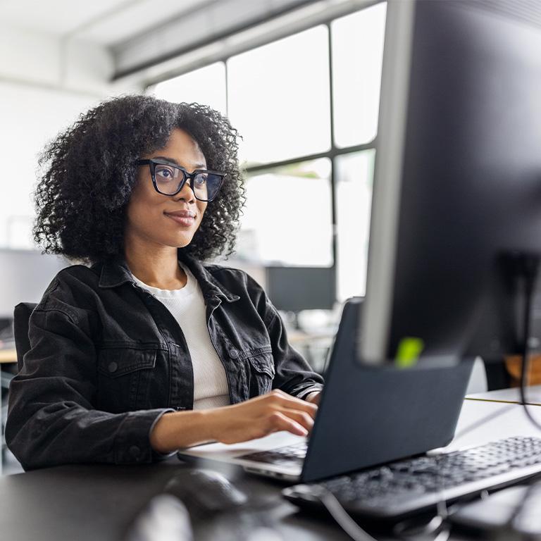 woman working at a desktop